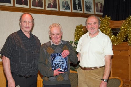 Allan Smith (centre) receiving his award from (left) Club secretary Les Dodd and (right) club captain Richard Curson