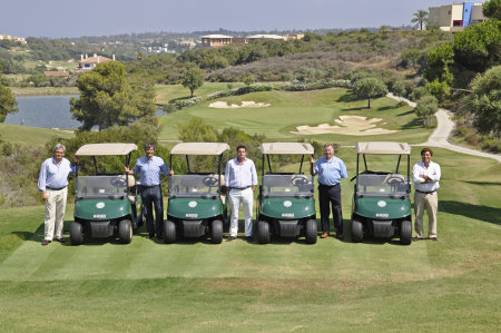 The E-Z-GO RXV golf cars at La Reserve with General manager Lucas de la Puente (centre) and representatives from Green Mowers and E-Z-GO