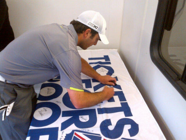 Flag being signed by Franceso Molinari, one of many European Tour players who signed the flag during the 2012 Johnnie Walker Championship