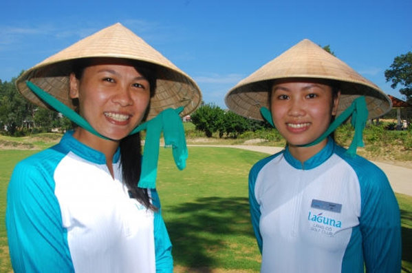 Two of Laguna Lang Co's new caddies, Thao Nguyen and Quyen Dang