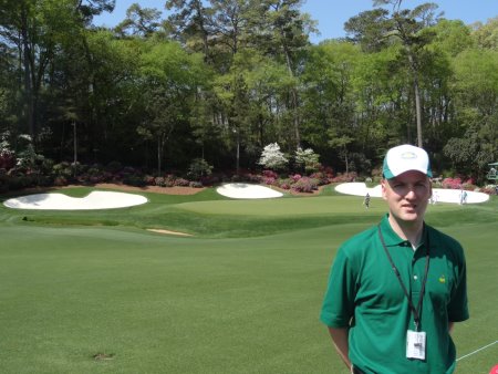 Gavin is pictured on Amen Corner, with the 13th green in the background