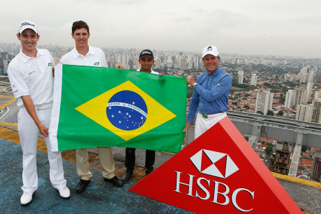 Gary Player with three young Brazilian golfers on the helipad on the roof of CentenarioPlaza, one of the tallest buildings in Sao Paulo (L-R: Daniel Stapff, Rafael Becker, and Cristian Barcelos)