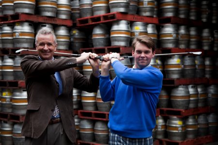 Paul Clouting, general manager Thorpeness Hotel and Golf Club, swings right handed and Christopher Oldrey, PGA Professional at Thorpeness Hotel and Golf Club swings left handed at Adnam’s Brewery to launch the Suffolk Ale and Golf Trail 