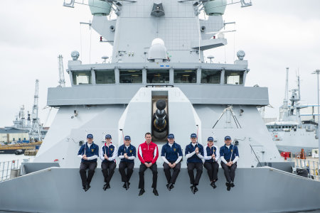 Royal Navy golf team members on board the new Type 45 class warship HMS Duncan in Portsmouth Dockyard with Commander Kevin Seymour (right centre) and Premium Golf’s Alex Nicolson (left centre)