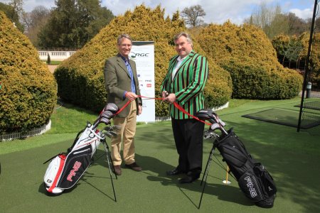 Help for Heroes founder Bryn Parry watches International Rugby star Jason Leonard cut the tape to open the new Huxley all-weather golf practice facility at the Help for Heroes Tedworth House Recovery Centre