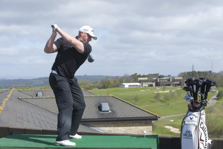 2010 World Long Driving Champion Joe Miller driving from the roof of the Celtic Manor Resort.