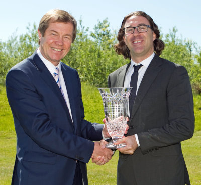 George O'Grady CBE, Chief Executive of The European Tour, receives his Lifetime Achievement Award from Andrea Sartori, Head of KPMG’s Golf Advisory Practice