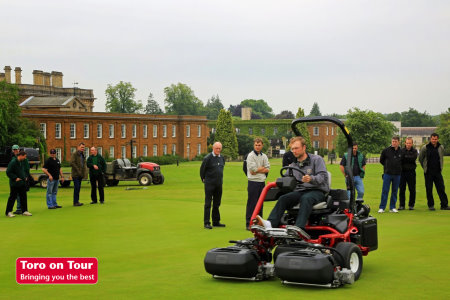 Visitors at a Toro on Tour 2013 event at Heythrop Park look on as a Toro TriFlex Hybrid 3420 is put through its paces.