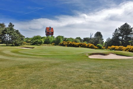Britain’s greenest golf course – The 18th hole at Thorpeness overlooked by the House in the Clouds