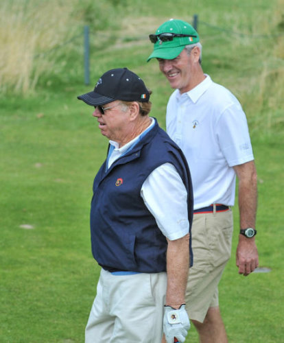 Tom Fazio surveys his recreation at Waterville Golf Links, watched by Dan Robertson, at the 24th Father & Son