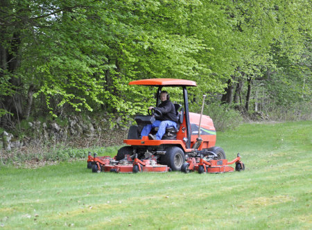 The Club’s Jacobsen HR5111 mowing the semi-rough