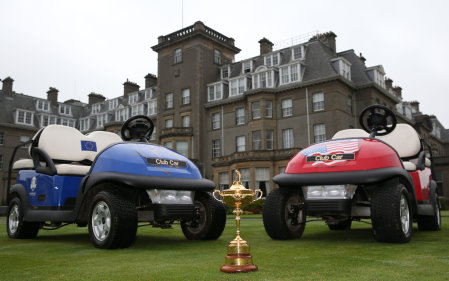 Ryder Cup trophy and two Club Cars outside Gleneagles