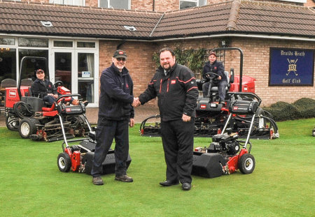 Jim Lake, left, with Lely’s Jonathan Lewis and some members of the greenkeeping team