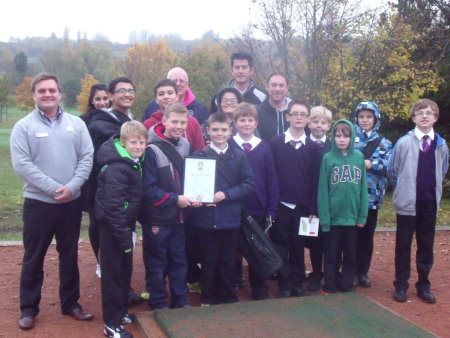 Centre manager Howard Craft and students from St. Paul’s Catholic School, Milton Keynes, are welcomed to Abbey Hill Golf Centre, where community engagement has helped earn the public pay-and-play facility the international sustainability award, GEO Certified™