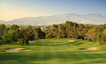 The Pyrenees form a backdrop on the third hole at Torremirona Golf & Spa Resort