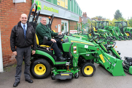 Area sales representative Richard Owens (left) of John Deere dealer Turner Groundscare, with Bill Hancox of Wirral Borough Council and part of the new John Deere machinery fleet.