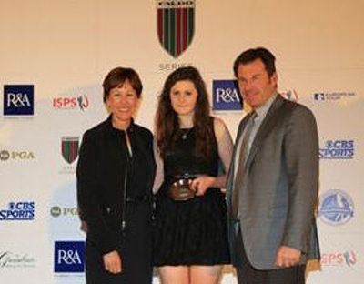 Olivia Mehaffey of Northern Ireland receives her Faldo Series Girls’ Under-16 runner-up trophy from Sir Nick Faldo and The PGA of America’s Suzy Whaley at The Greenbrier, USA in October 2013