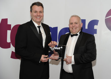Simon Fletcher, PGA Professional at Morecambe Golf Club (right) receives his Pro Shop of the Year award from TGI Golf Retail Consultant Chris Taylor
