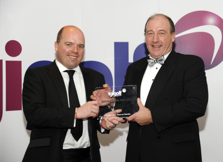 John Clark, PING Managing Director (right) collects his award for Supplier of the Year from TGI Golf Chairman Gordon Stewart