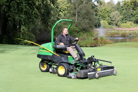 Meldrum House Golf Club course manager Kenny Harper on the John Deere 2500E hybrid electric greens mower