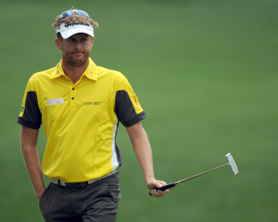 David Lynn wearing a Galvin Green Merwin Ventil8TM shirt in Vibrant Yellow during the first round of the Masters Tournament in 2013