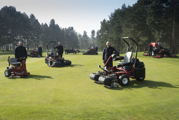 Course manager Richard Dorrington stands to the right with the club’s new TriFlex 3420 and his greenkeeping team and the Toro machines he’s chosen for 2014.
