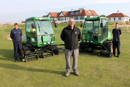 Western Gailes course manager Jim Devlin with (left and right) greenkeepers Ian Templeton and Ross Hodge and their new John Deere 7500 Precision Cut fairway mowers.