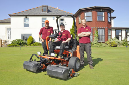 (l-r) Simon Clark, course manager; Michael Ray, sitting on mower and Gary Sharp