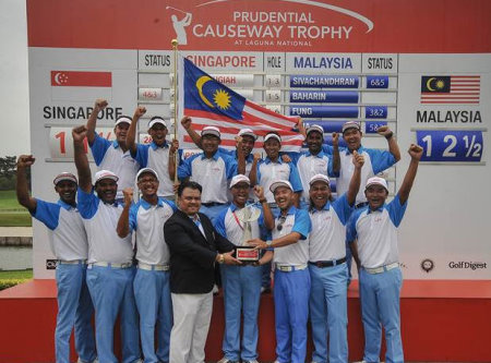 Malaysian Team celebrate Causeway Trophy victory