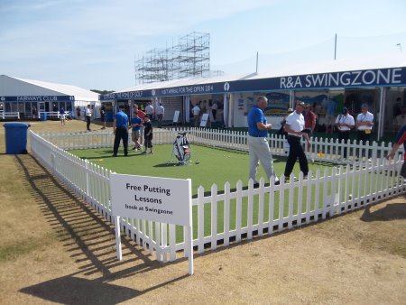 Fans receive expert tuition on the Huxley Golf putting green at last year’s Open Championship (© Huxley Golf )