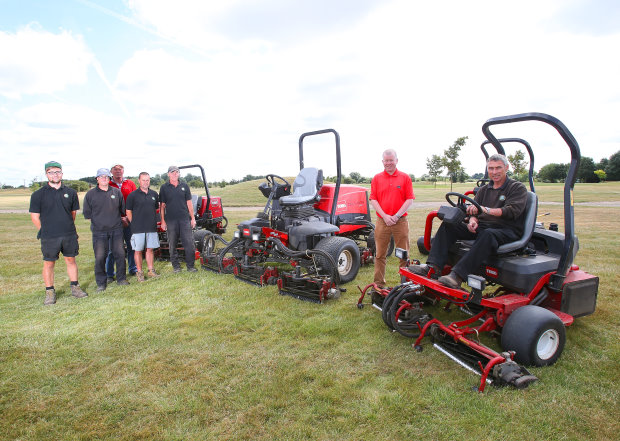 Course manager Dave Webster is seated on one of the club’s Toro Greensmaster 3250-Ds. Standing on his left is Lely’s Richard Freeman and to the very left is the club’s greenkeeping team