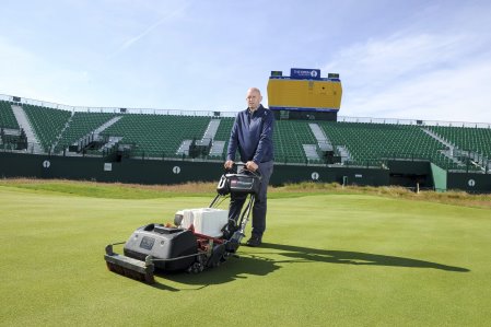 Craig Gilholm, course manager at Royal Liverpool Golf Club, with Toro’s eFlex lithium ion battery-powered greensmower