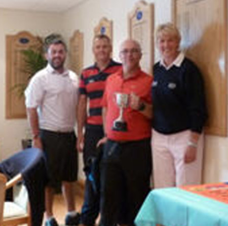 The team from Phoenix House Recovery Centre receiving the Sarah Bennett Challenge Cup