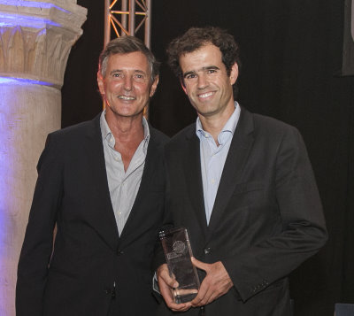 the resort's operations director, António Pinto Coelho (right), receiving the award
