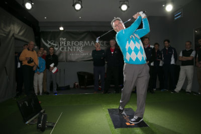 Former Ryder Cup captain Bernard Gallacher strikes the first shot from the UK's most advanced golf teaching facility at World of Golf in New Malden, London