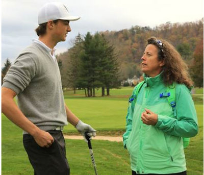 Seve Prins of The Netherlands receives advice from Fanny Sunesson on the Old White TPC course at The Greenbrier in West Virginia, USA