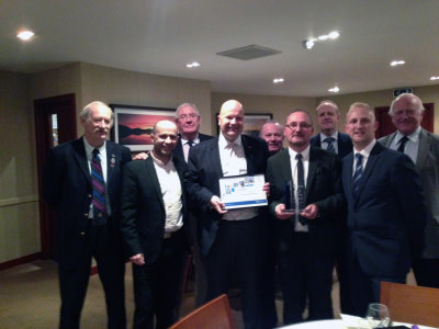Alan McCloskey, fourth right, receiving his award with PGA of Scotland secretary Brian Mair pictured fourth from left