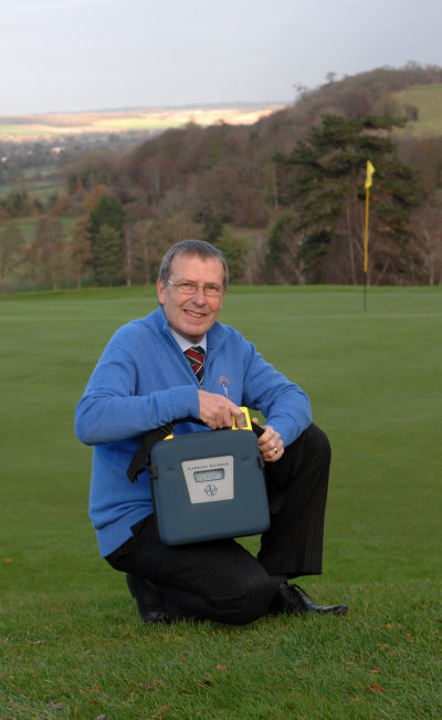 Picture of Temple Golf Club manager Matthew Wellings with the defibrillator which saved his life