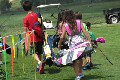 Broken Tee Group of kids with golf bags