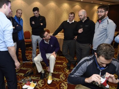 TGI Golf Partners enjoying a practical demonstration of shoe fitting from FootJoy University