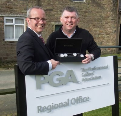 IME PLEASE! Gary Butler, right, shows a selection of his watches to PGA North secretary Graham Maly