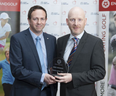 Mike Greener (right) receiving his England Golf national Volunteer of the Year award in 2014