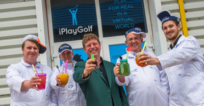 Neil Wilcox  (in the green jacket) with his team at iPlayGolfUK