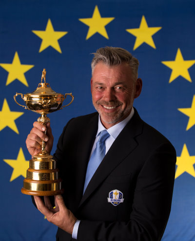 2016 European Ryder Cup Captain Darren Clarke of Northern Ireland poses with the Ryder Cup trophy during a Ryder Cup Photocall at the Sofitel hotel on March 23, 2015 in London, England.  (Photo by Richard Heathcote/Getty Images)