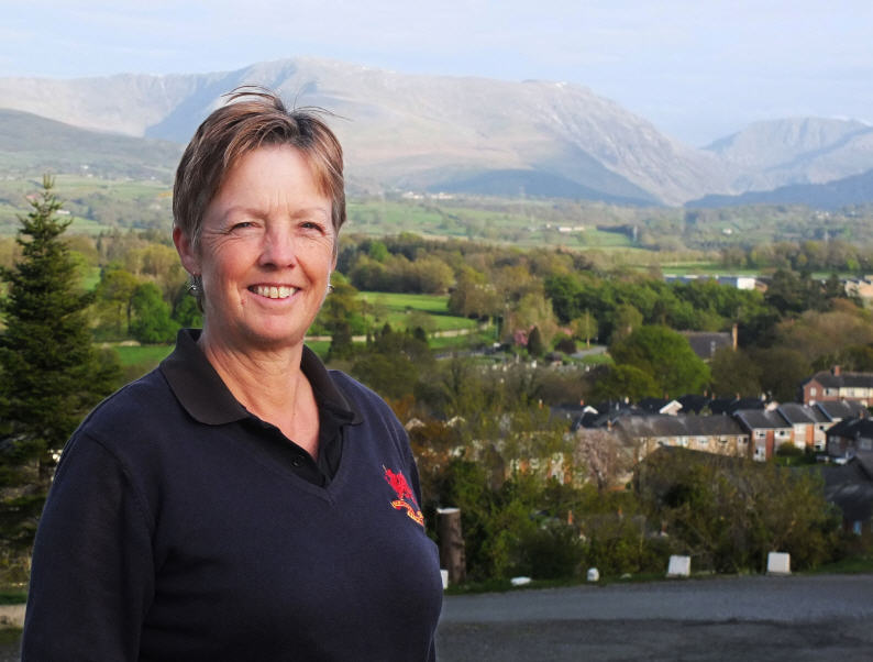 Janet Davies has been appointed president of Bangor St Deiniol Golf Club with views shows Jan on the practice putting green with Snowdonia as a magnificent backdrop to the golf course