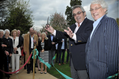 Tony Jacklin cuts the ribbon with Rick Cressman (owner of Nailcote Hall)