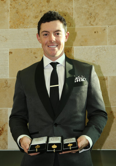 Rory McIlroy with PGA medals (courtesy of Getty Images)