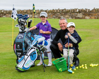 Jack Dirkin, Gary Player, Tommy Morrissey Junior golf sensations Jack Dirkin (5) and Tommy Morrissey (4) got to meet golf legend Gary Payer in St Andrews as they tried out new revolutionary kids golf clubs designed in Scotland. Five-year-old Jack from Shropshire, the UKs number one Under-5 golfer, has qualified for the World Under-6 championships in Pinehurst, Carolina, at the end of July 2015. Mean while Tommy, from Florida, who is already an internet and tv star due to his golfing ability despite being born without a right hand and lower arm. Golphin for Kids is a Scottish company whoes founder Calum McPherson invented a light weight golf club with a larger sweet spot to make it easier for kids to hit the ball well. Picture by John Young © www.youngmedia.co.uk 2015
