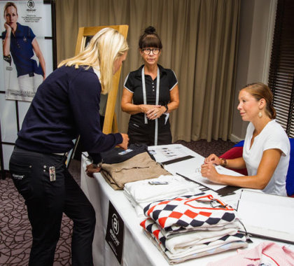 Carin Koch, European Team Captain (left), with abacus representatives at The Solheim Cup team fitting session