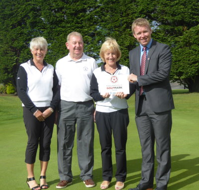  Phil Graham (right), county development officer for Durham, presents Houghton-le-Spring GC  with their GolfMark award with (left to right) Margaret Shaw, Business Development Team, David Freeman, Club Secretary, and Ann Young, Development Team and Committee
